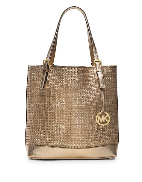 white and gold michael kors purse|Michael Kors large gold tote.